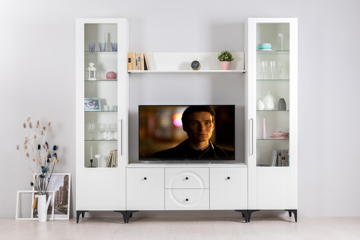 Валенсия Гостиная 16.45 Тумба под ТВ, цвет ЛДСП белый шагрень/МДФ белый шагрень, ШхГхВ 133,1х38,3х63,7 см.